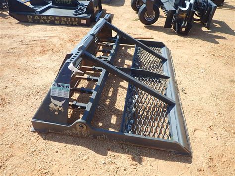 used skid steer land leveler|leveling ground with a bobcat.